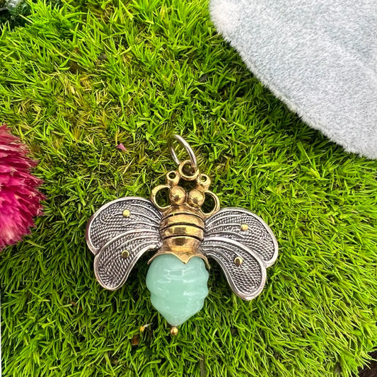 retired waxing poetic bee brave aqua pendant